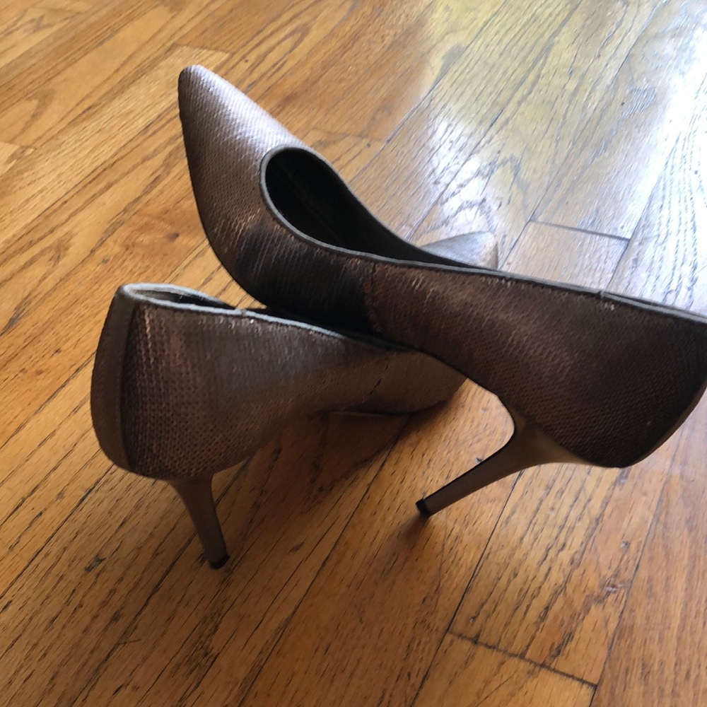 Brushed silver dress shoes. High heel.